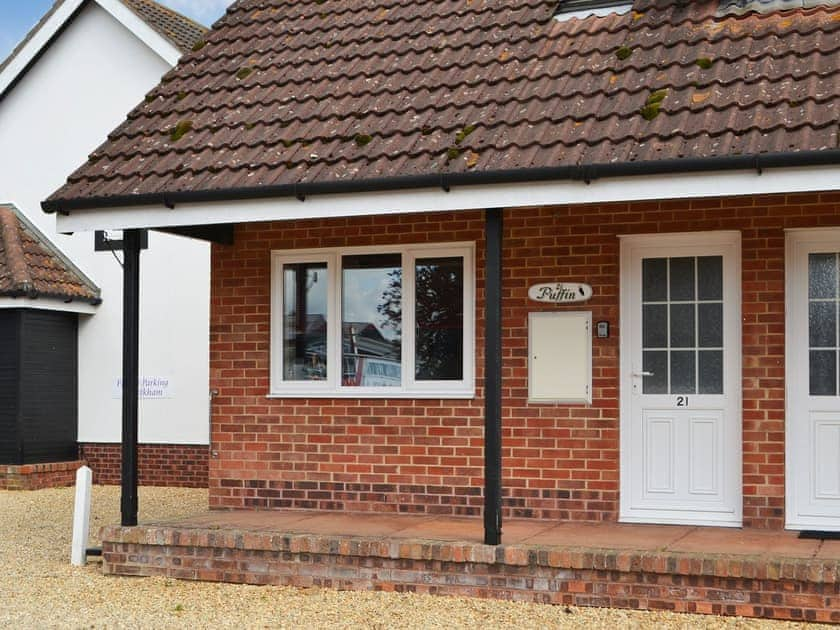 Welcoming riverside cottage entrance | Puffin Cottage, Wroxham