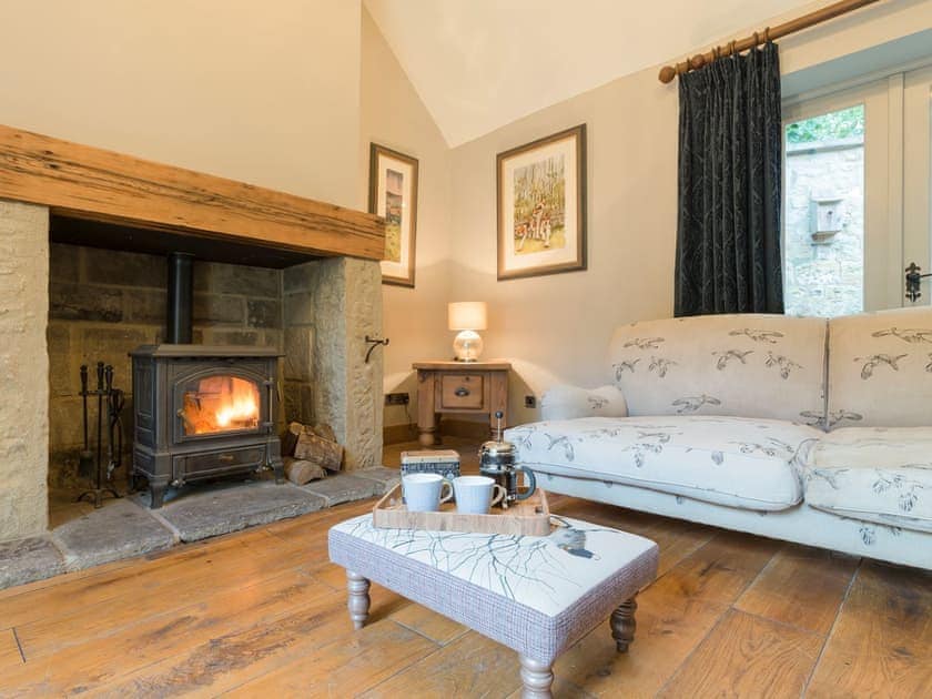 Comfy Living room with wood burner and French doors leading to garden | The Coach House, Riding Mill, near Corbridge