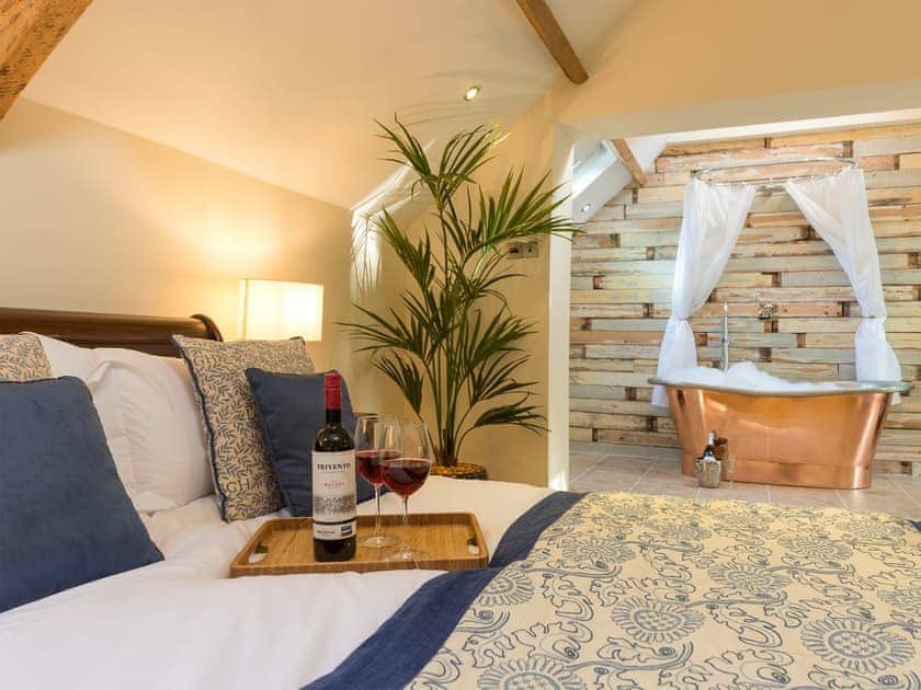 Spacious bedroom with double sleigh bed and en-suite  | The Coach House, Riding Mill, near Corbridge