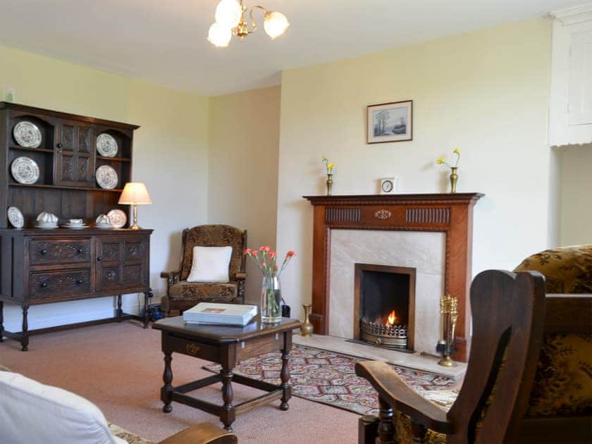 Traditional and warm living room | East Bridge End Farm, Frosterley, near Stanhope