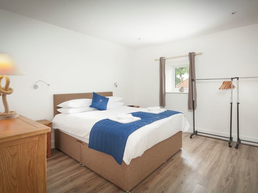 Relaxing first floor Double bedroom with en-suite | Bewick Swan - The Riverviews, Wroxham, near Norwich