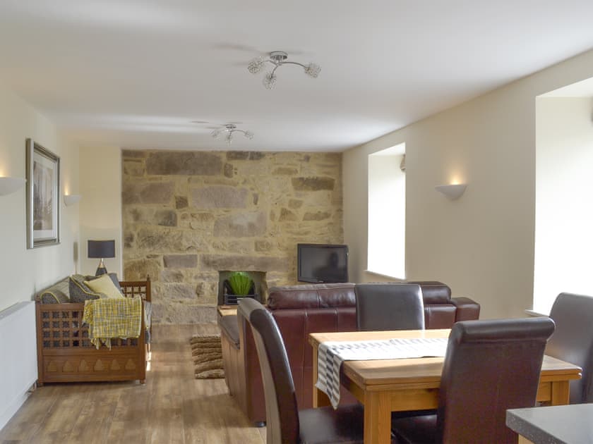 Convenient dining area within open-plan living space | Swallow View - Jackson Road, Matlock