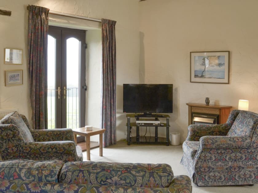 Cosy living area of open-plan room | Black Rock - Kennacott Court Cottages, Widemouth, near Bude