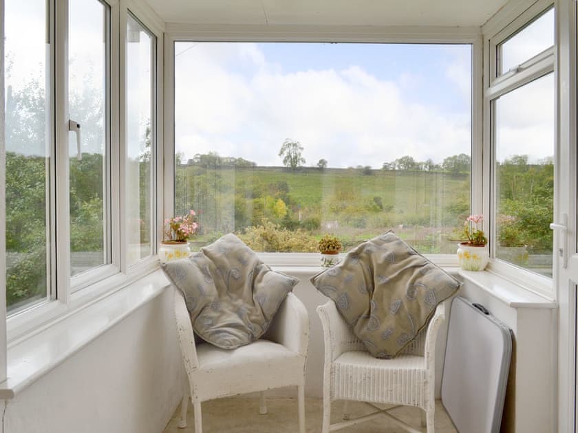 Great rural views from the porch seating area | Walter’s Cottage, West Compton, near Shepton Mallet
