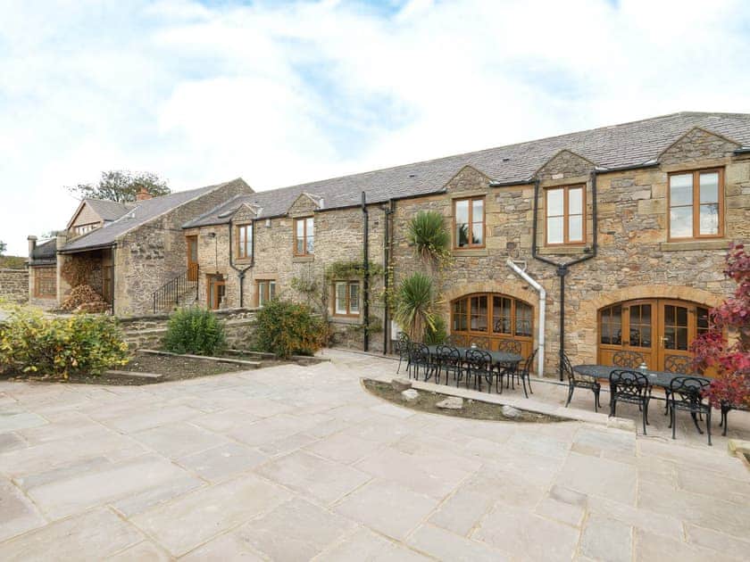 Large patio area | The Old Mill - The Old Mill Cottages, Little Mill, near Craster