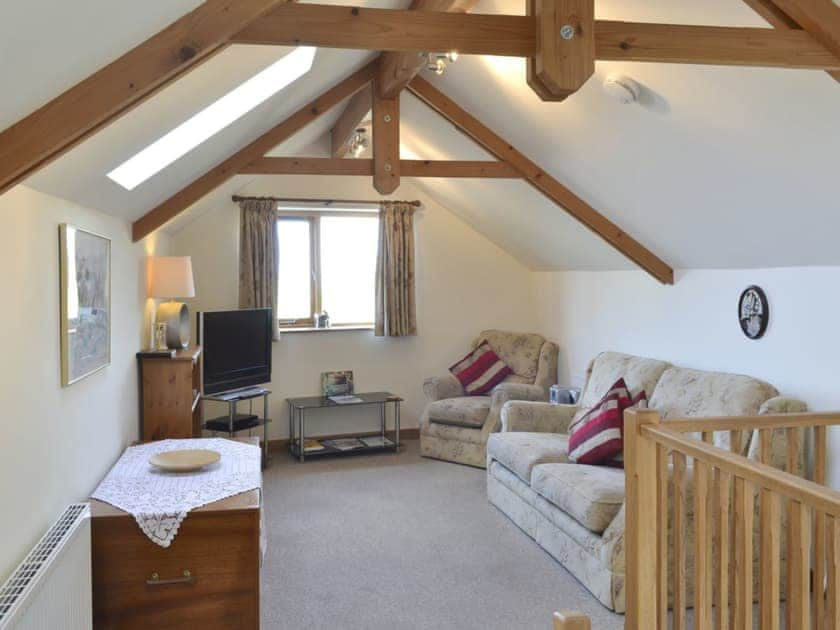 Spacious open plan living space woth vaulted beamed ceilings | Saundrys Barn, Port Isaac