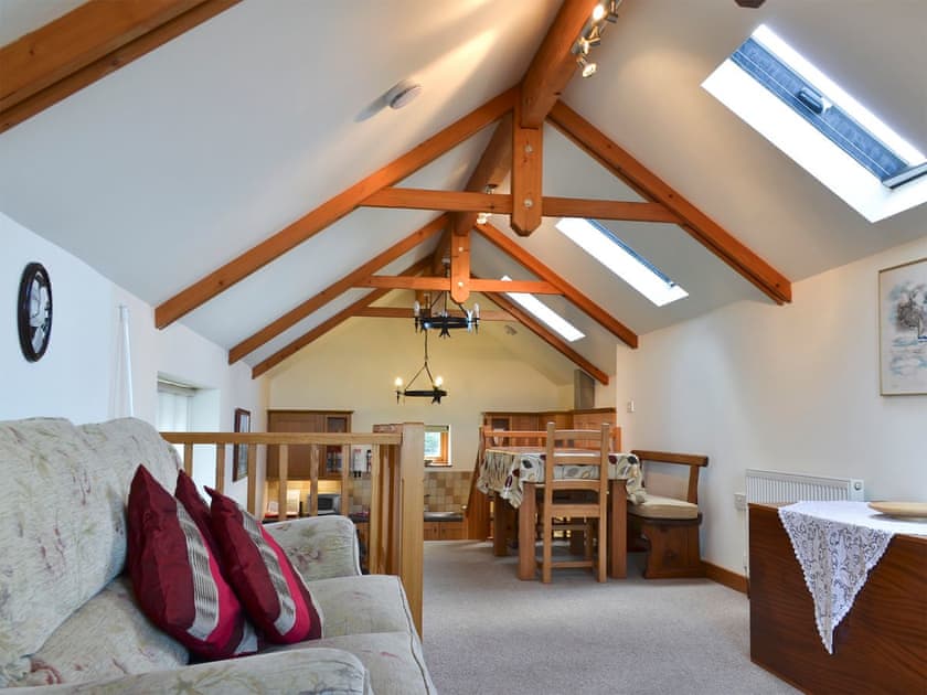 Spacious open plan living space woth vaulted beamed ceilings | Saundrys Barn, Port Isaac