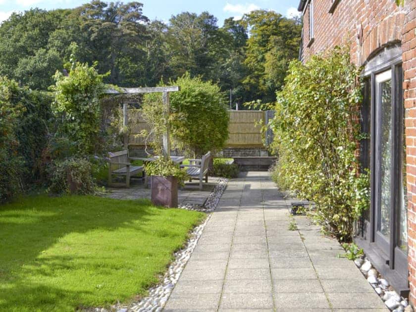 Patio area with outdoor seating | The Coach House, East Somerton