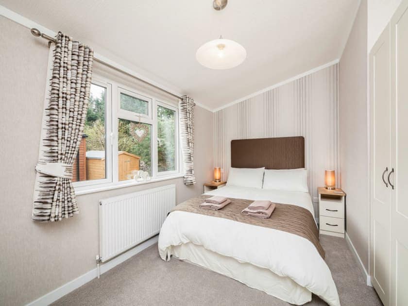 Warm and welcoming master bedroom | Thistle Lodge, Auchterarder