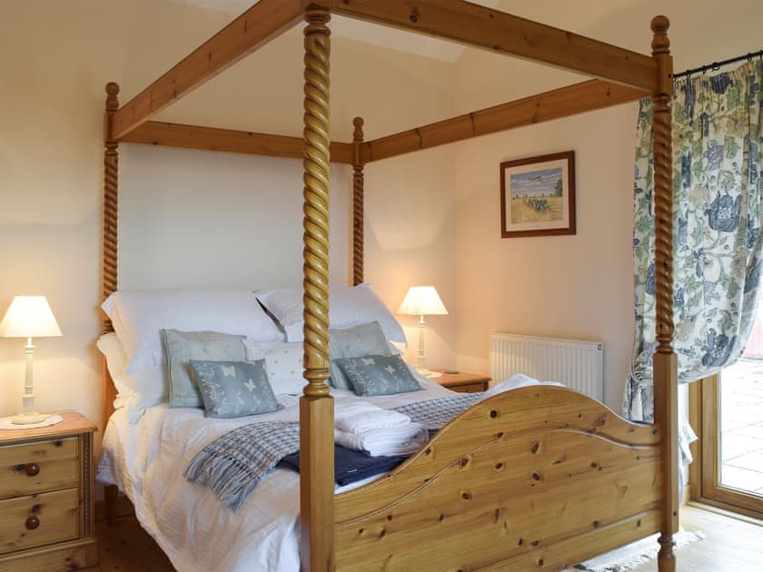 Four poster bedroom | Barns End Cottage - Croft Farm Cottages, Ludchurch, near Narberth