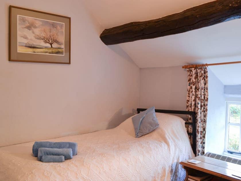 Charming twin bedded room | Upper Stanbatch Cottage, Wentnor, near Bishops Castle