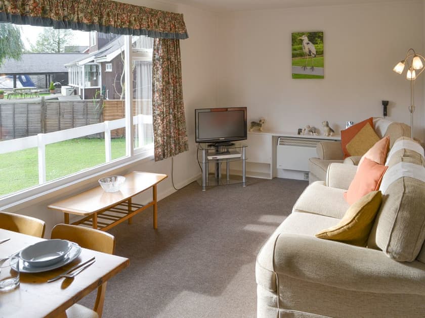 Spacious living and dining room | Silver Birches, Horning