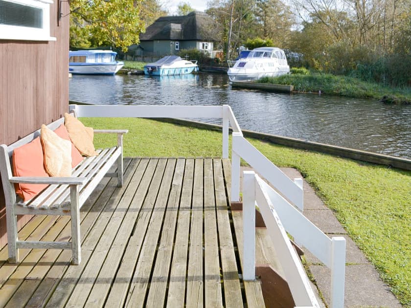 Raised decking wit outdoor seating | Silver Birches, Horning