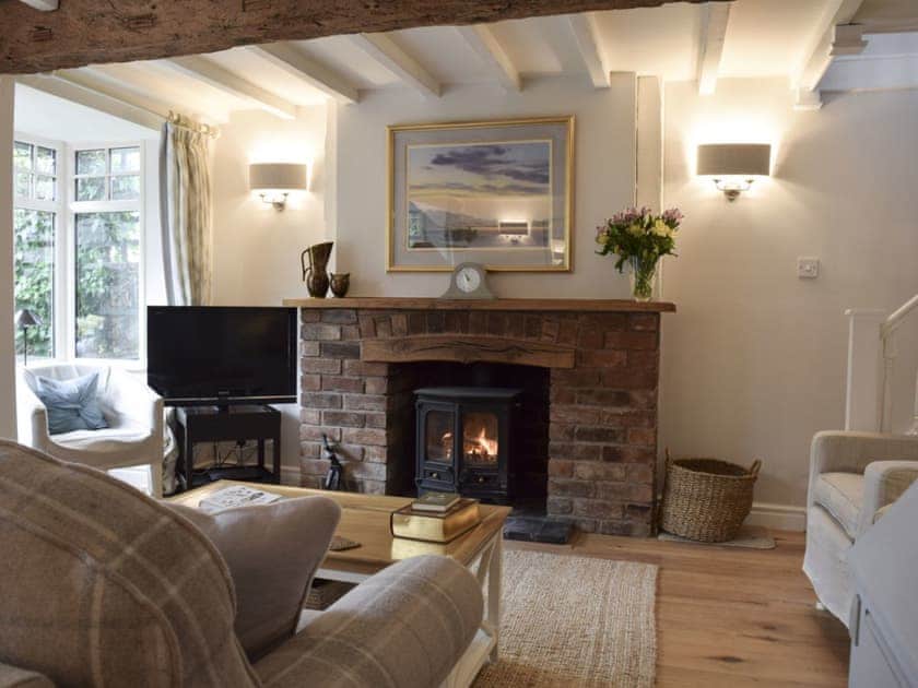 Cosy living room with wood burner  | Bevington, Snitterfield, near Stratford-upon-Avon