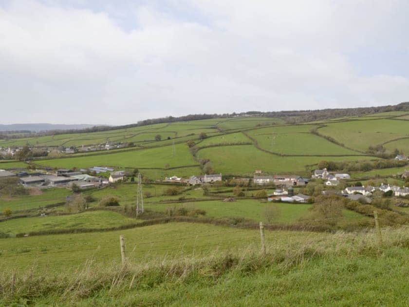 Situated on a working farm at the centre of this image | Hay Rick, Scrumpy Barn, Milk Churn - Hayes Farm Mews, Luton, near Newton Abbot