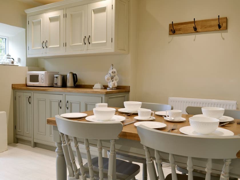 Convenient dining area within kitchen | Ivy Cottage, Grassington, near Skipton