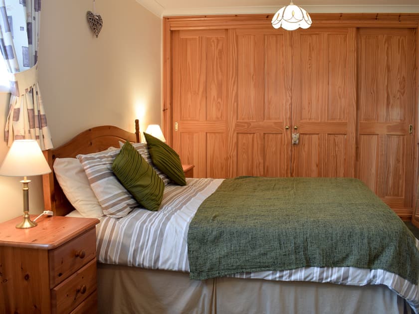 Bedroom with double and 2 single beds | Pen Y Bryn Apartment, Manordeilo, near Llandeilo