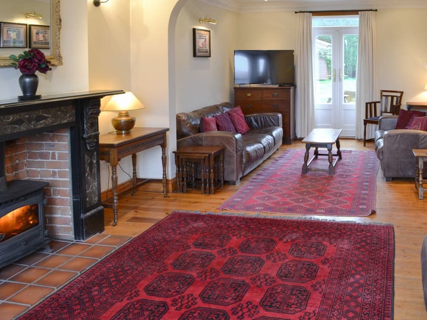 Spacious living room with wood burner | Pembroke House, Happisburgh
