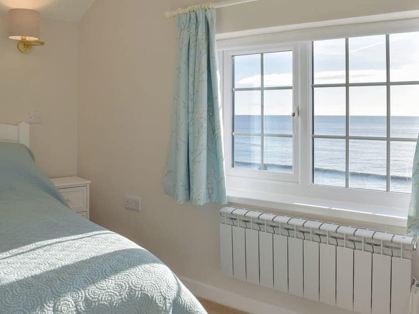 Double bedroom with direct views of the sea | Mole End, Amroth, near Saundersfoot