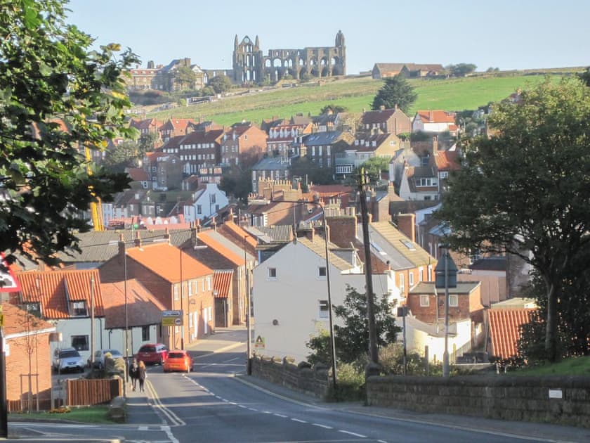 The ruins of Whitby Abbey perched on the headland above the town | Demeter House, Whitby