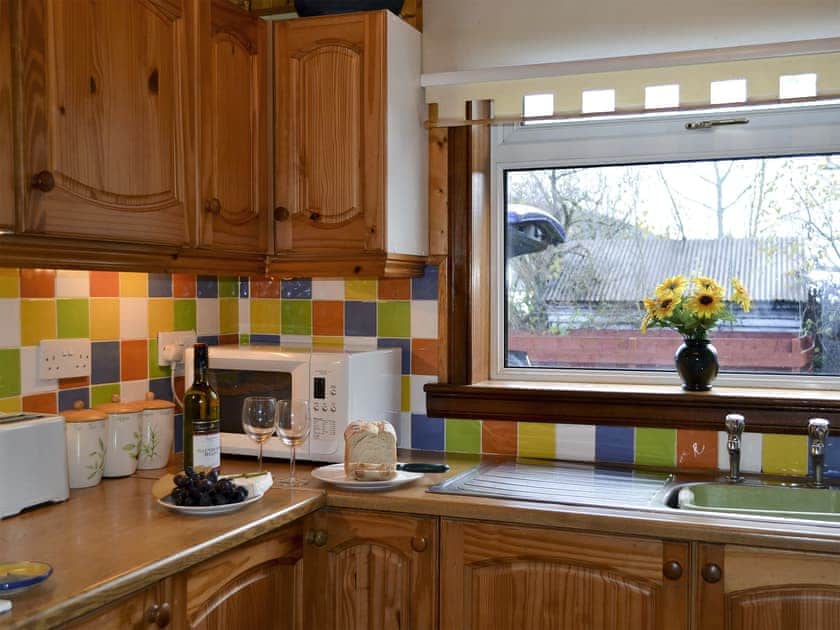 A well equipped kitchen. Coffee pod machine | Riverside Cottage, Drumnadrochit, near Loch Ness