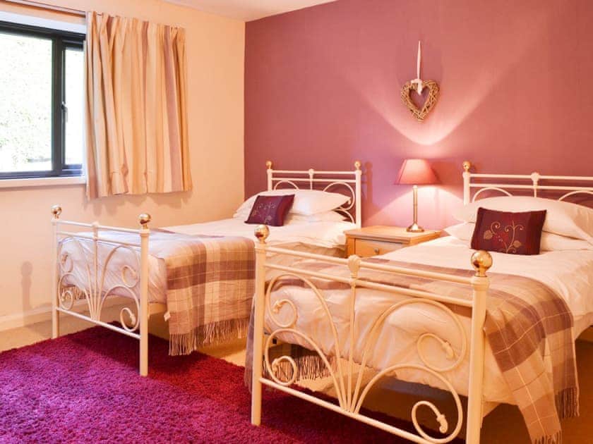 Delightful twin bedroom with antique style beds | Waterhead Studio, Near Ambleside