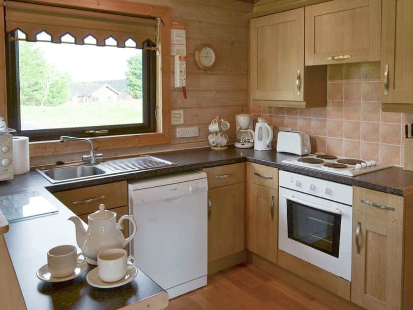 Well-equipped fitted kitchen area | The Retreat, Bideford, near Northam