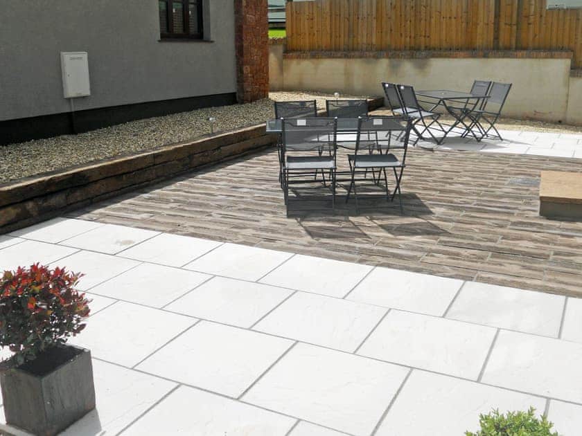 Shared patio area | The Old Piggery - Longmeadow Farm, Shaldon, near Teignmouth