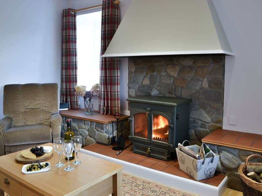 Cosy living room with wood burner | Glebe Cottage, Urray, near Dingwall