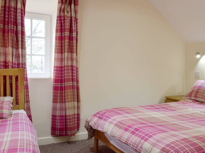 Bedroom with comfy double bed and an additional single bed | Carthouse Cottage - Ivy Court Cottages, Llys-y-Fran