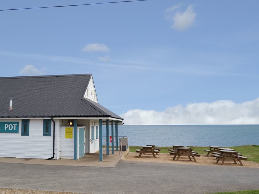 Explore the seafront cafes and take in the view