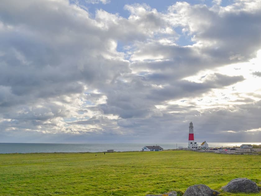 Set in open countryside overlooking the sea | Lloyds Cottage, Portland, near Weymouth