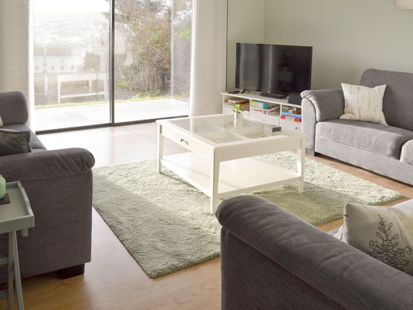 Ground floor living area with patio door to garden area | Lyndhurst, Perranporth