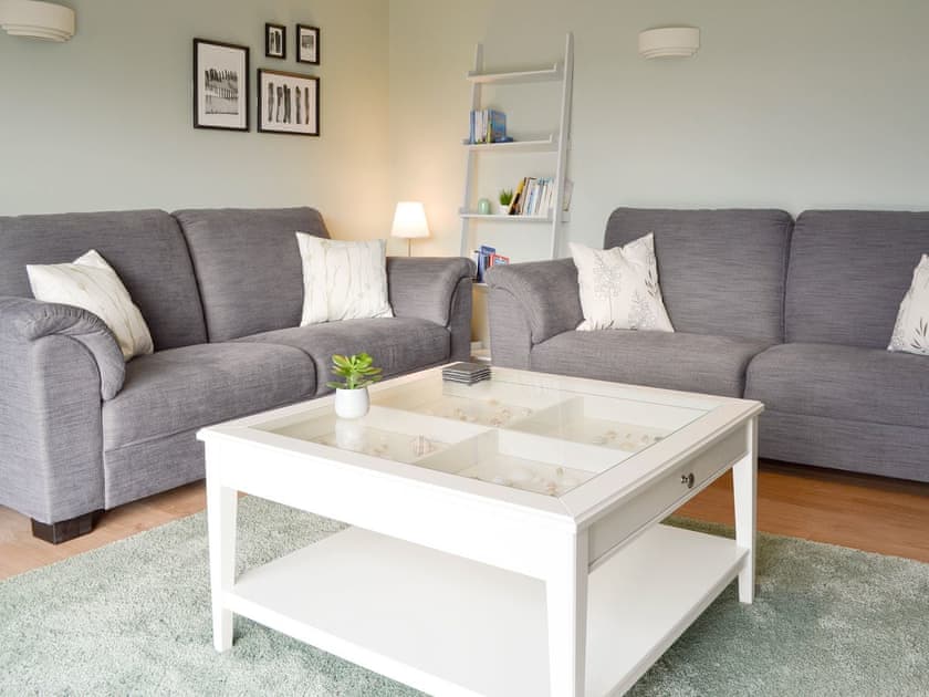 Comfy seating within ground floor living room | Lyndhurst, Perranporth