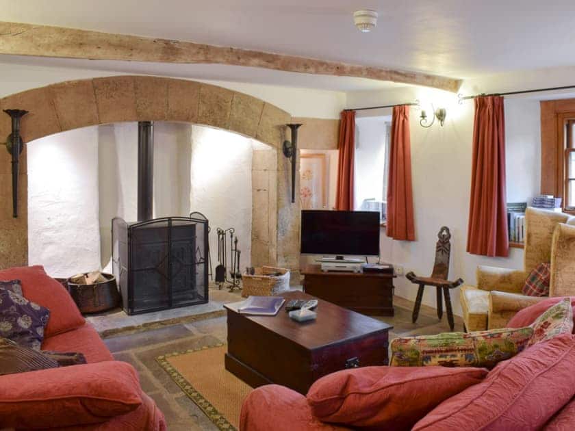 Spacious living room with cosy wood burner | West Cottage - Feetham Holme Cottages, Low Row near Reeth