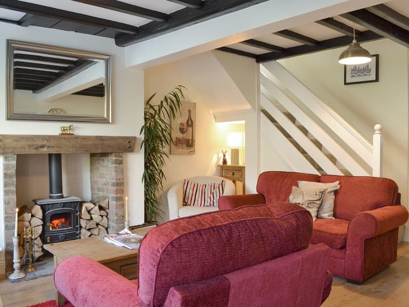 Characterful living area with wood burner | Church Court Cottage, Beeford, near Hornsea