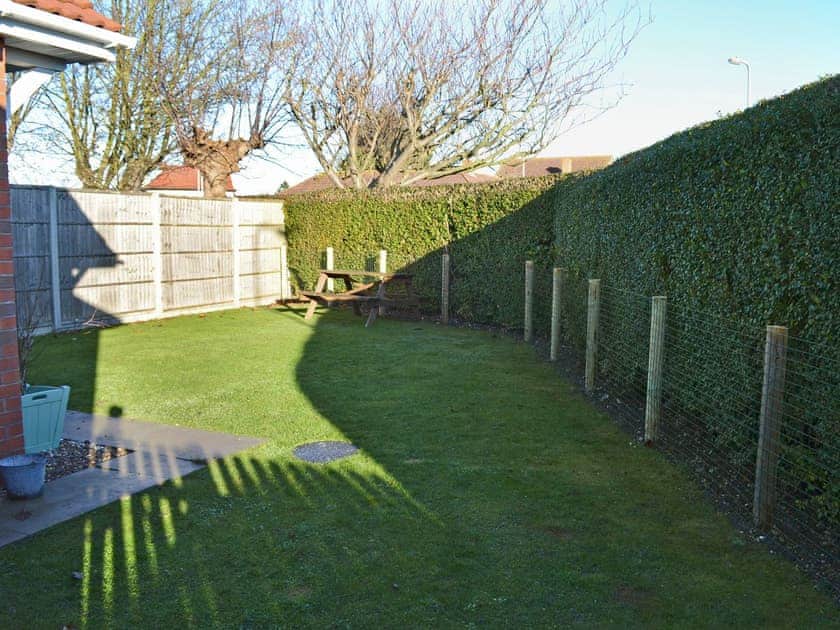 Peaceful garden | Crab Cottage - Coastal Cottages, Sutton-on-Sea, near Mablethorpe