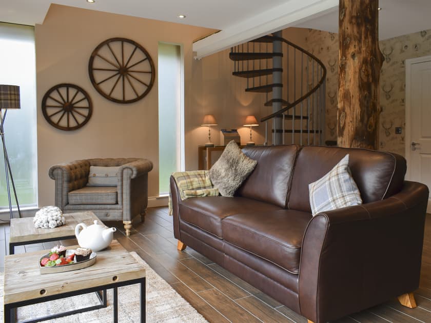 Comfortable living area | Trunkie Cottage, Brig o’ Turk, near Callander