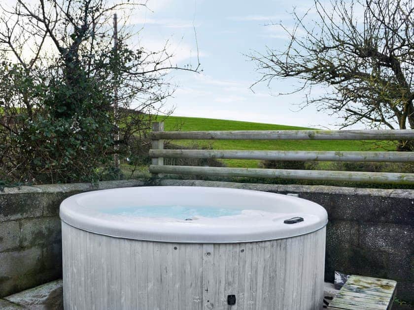 Inviting hot tub | Little Barn - Peniarth Bach Farm, Betws-Yn-Rhos, Conwy