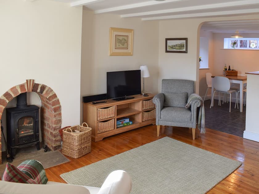 Beamed open plan living space | Rowan Cottage, Aislaby, near Whitby
