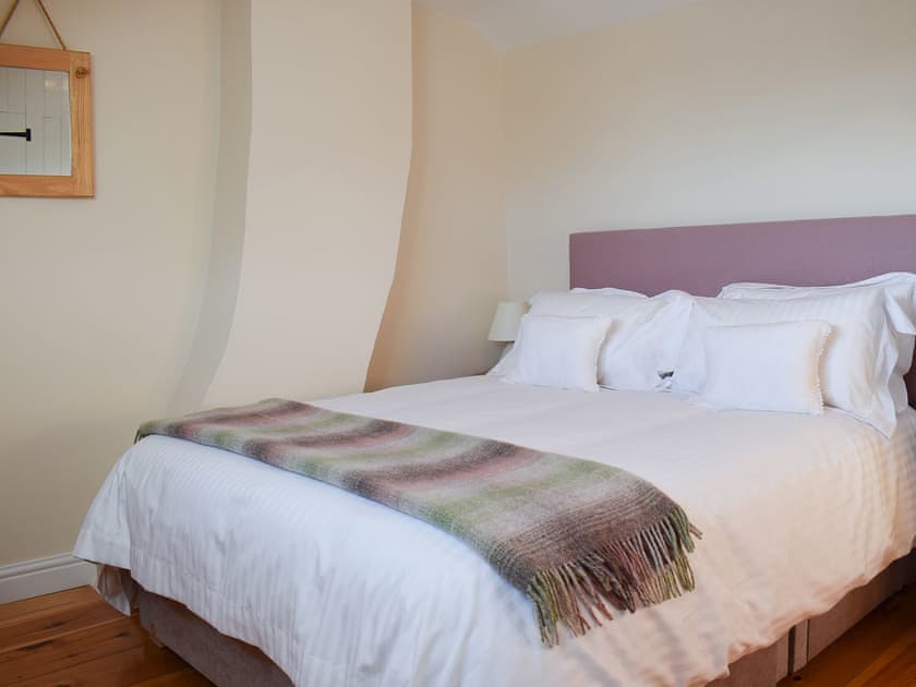 Cosy and inviting double bedroom with kingsize bed | Rowan Cottage, Aislaby, near Whitby