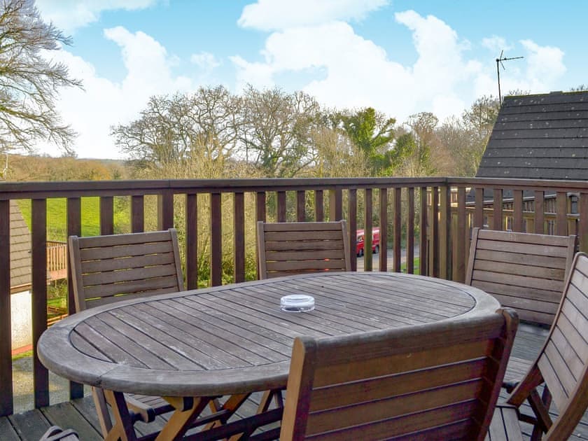 Relaxing sitting out area on the decked balcony | Valley Lodge 47, Gunnislake, near Callington