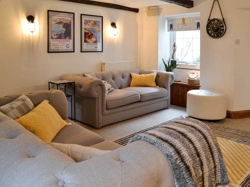 Cosy living room with multi-fuel burner and smart TV | Harbour Hideaway, Ilfracombe
