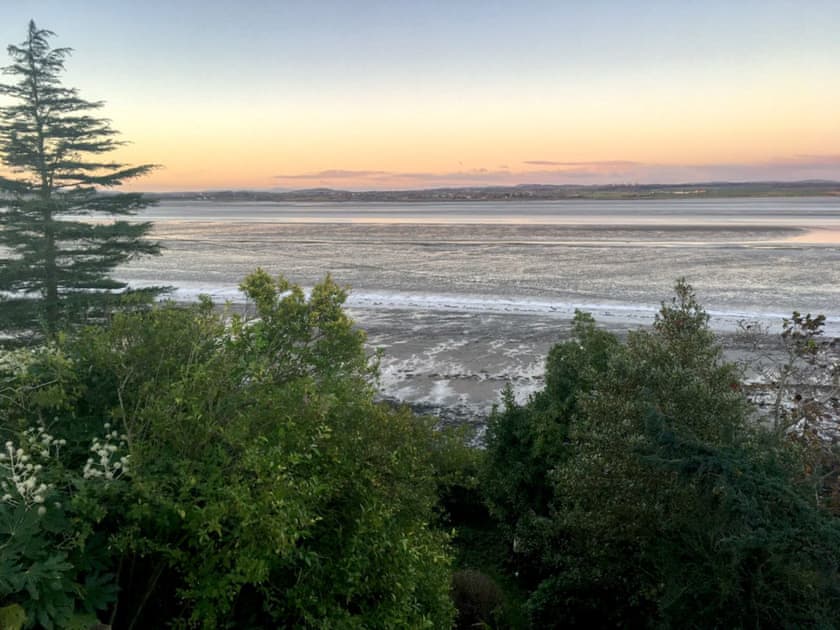 Stunning sunset view from the upstairs bedroom | Bank Cottage, Bowness-on-Solway