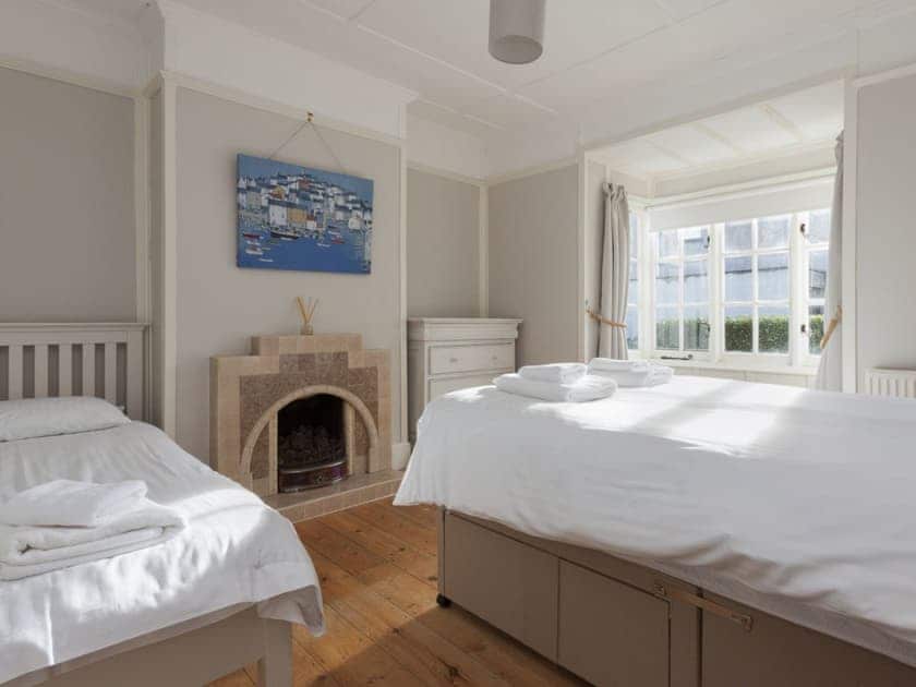 Charming ground floor bedroom with double and single beds | Torrings, Salcombe