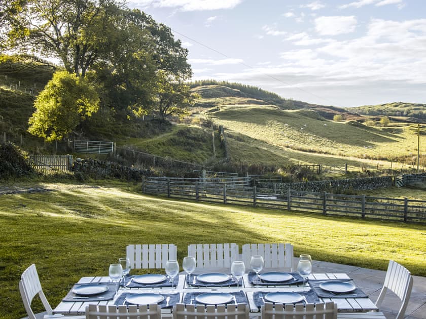 Wonderful rural views from the paved patio area | Blairinnie - Barwhillanty Estate, Parton, near Castle Douglas
