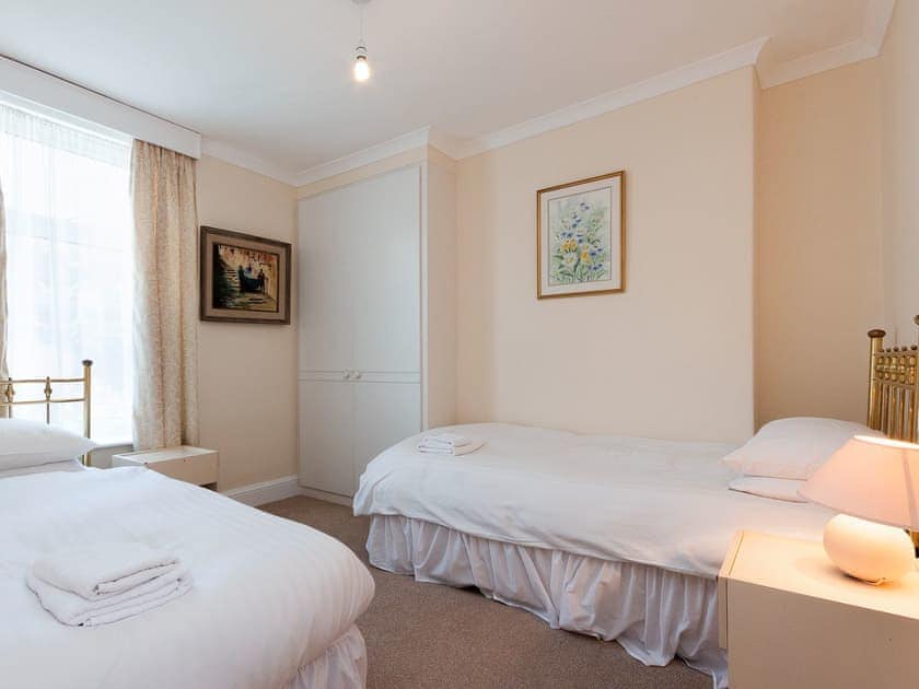 Bedroom containing double and single beds | Sandquay Road 9, Dartmouth