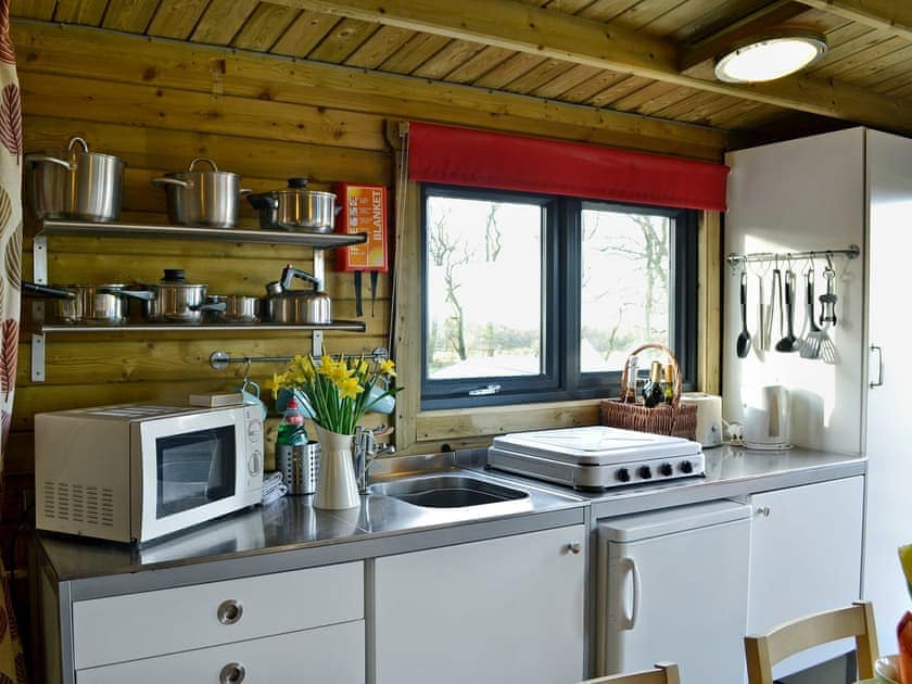 Well equipped kitchen area | Kestrel Cabin - Wallace Lane Farm Cottages, Brocklebank, near Caldbeck and Uldale
