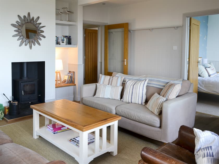 Relaxing living room with cosy wood burner | Gullsway, Beadnell
