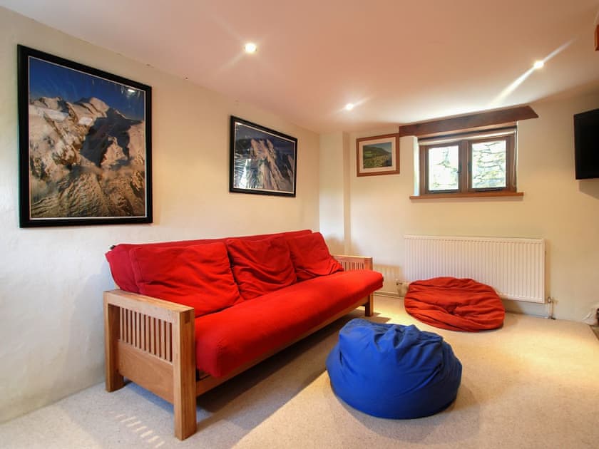 Comfortable sitting room with entertainment system | Ty Newydd, Llyn Geirionydd, near Llanrwst